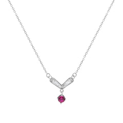 Silver necklace with a V-shaped pendant and red gemstone on a white background