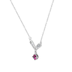 Silver necklace with a red gemstone pendant on a white background
