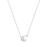 Silver necklace with a moon and star pendant on a white background