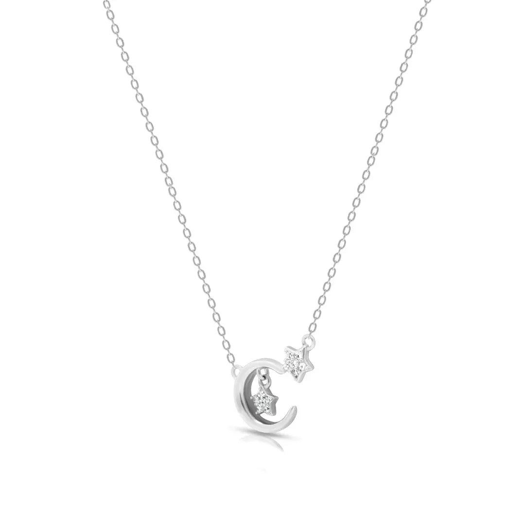 Silver necklace with a crescent moon and diamond pendant on a white background