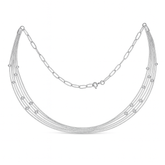 Silver necklace with multiple strands on a white background