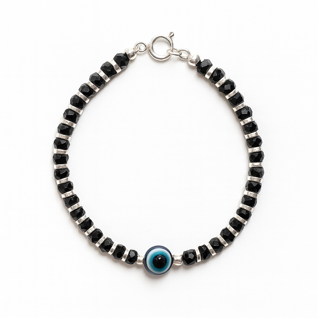 Black beaded bracelet with a blue evil eye charm on a white background