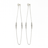 Silver beaded necklace on a white background