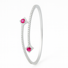 Silver bracelet with pink gemstones on a white background
