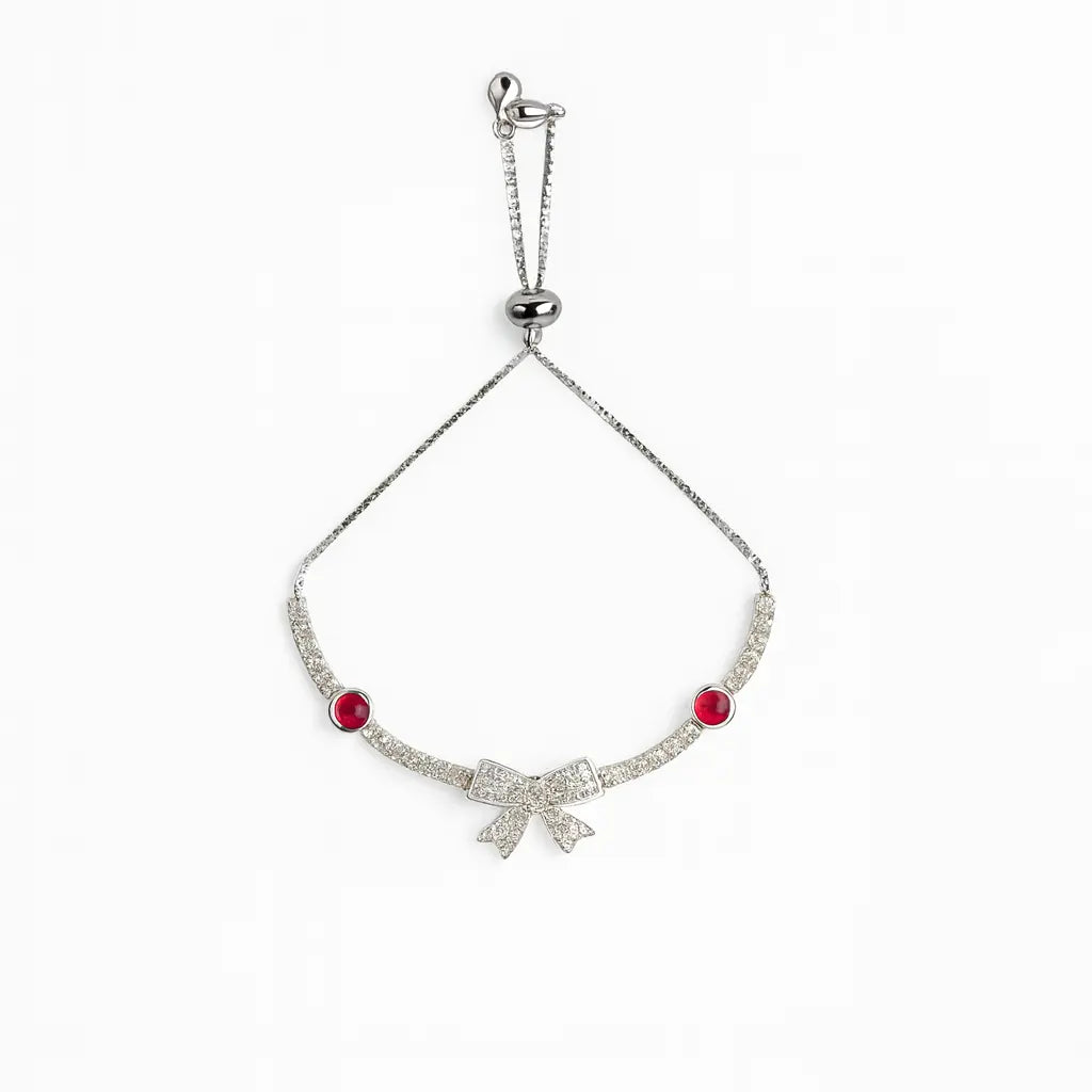 Silver Bow Charm Bracelet with Ruby Accents Mashha