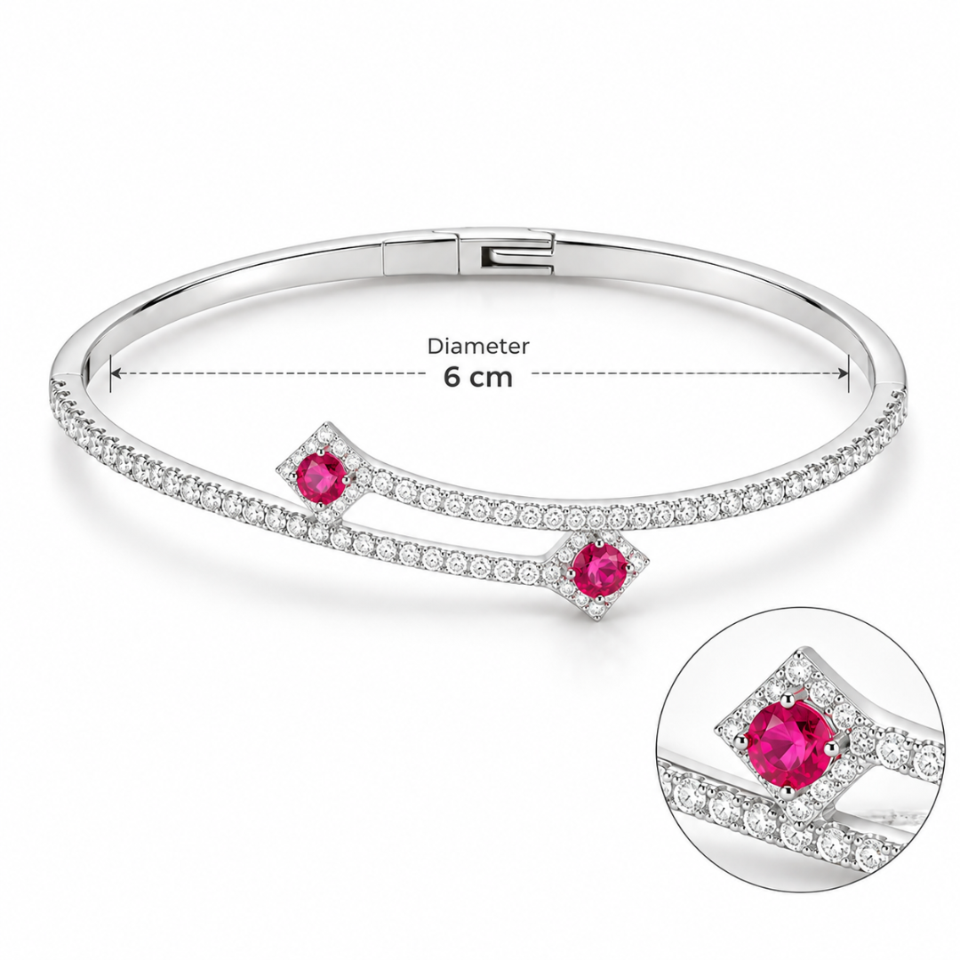 Silver bracelet with pink gemstones on a white background