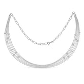 Silver necklace with multiple strands on a white background