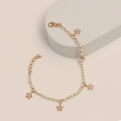 Pearl Strand with Star Accents Silver Bracelet