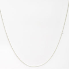 Silver chain necklace on a white background
