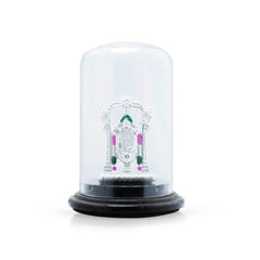 Decorative item with a clear dome and black base on a white background