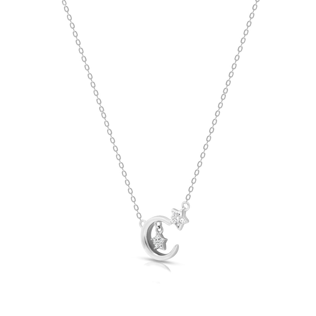 Silver necklace with a crescent moon and diamond pendant on a white background