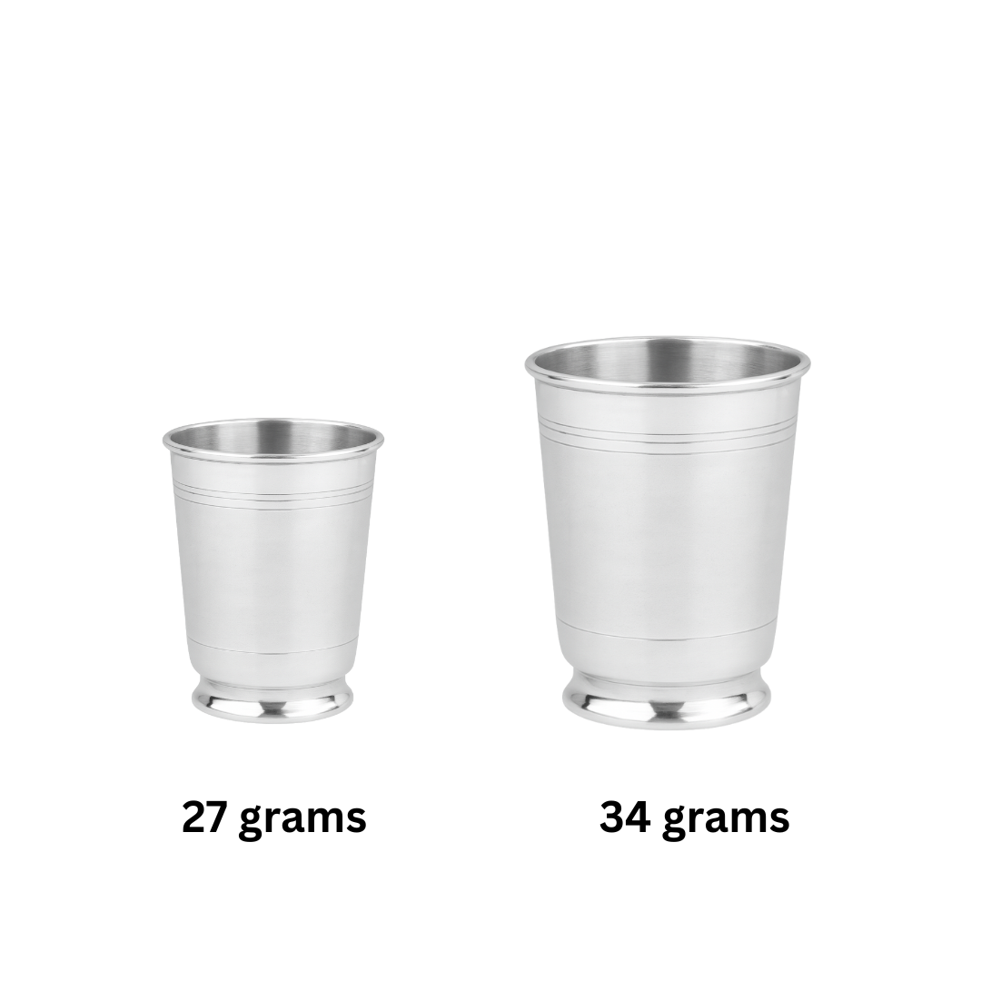 Two silver cups with weight labels on a white background