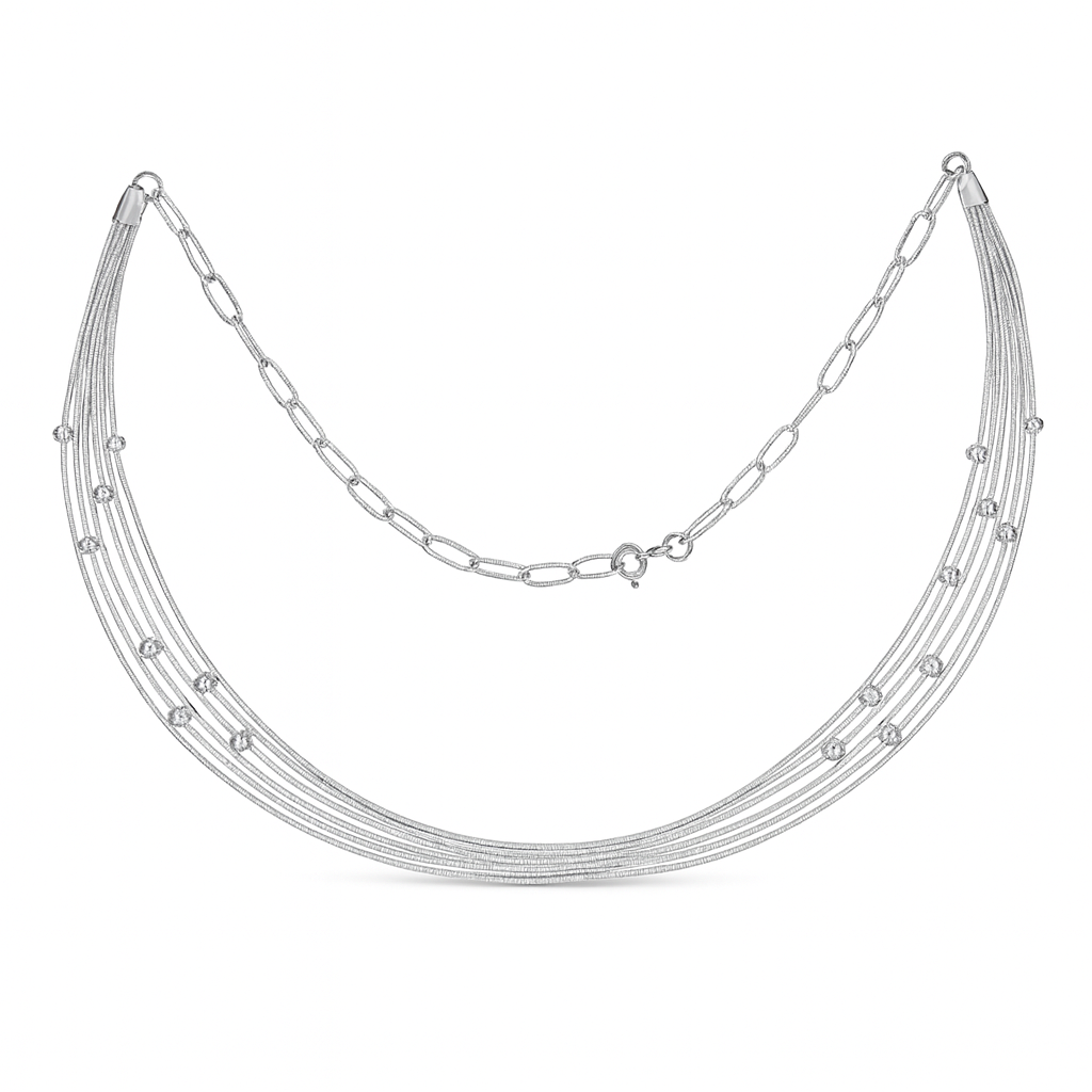 Silver necklace with multiple strands on a white background