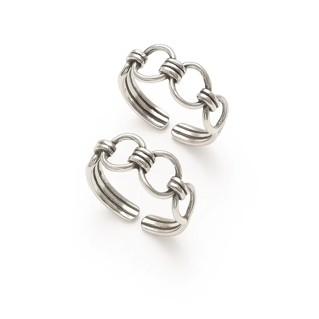 Pair of silver hoop earrings on a white background