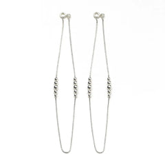 Silver beaded necklace on a white background