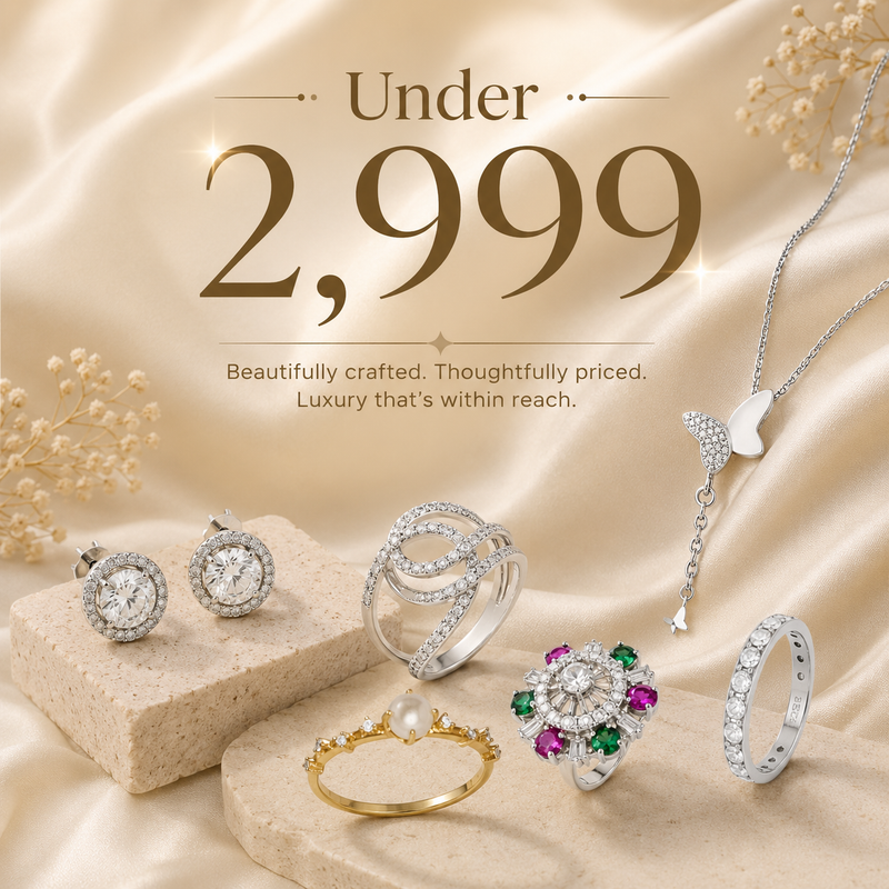 A luxury jewelry collection displayed on beige satin fabric, featuring silver and gold rings, earrings, and a necklace. The image includes promotional text reading '